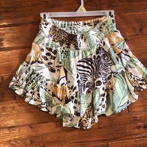 Mini skirt that raises up higher on the sides.